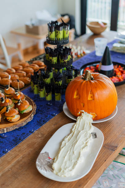 istock Halloween-themed catering served on a table at a costume party 2181927589