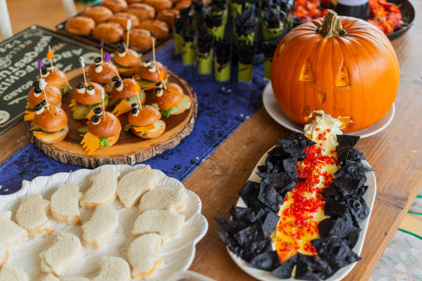 istock Halloween-themed catering served on a table at a costume party 2181927667