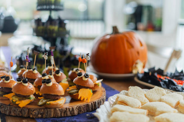 istock Halloween-themed catering served on a table at a costume party 2181927788