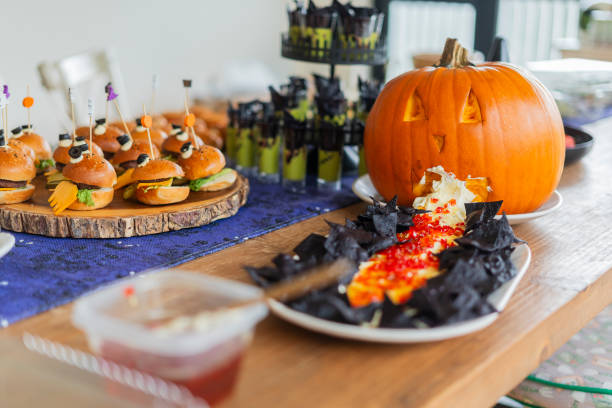 istock Halloween-themed catering served on a table at a costume party 2181927857