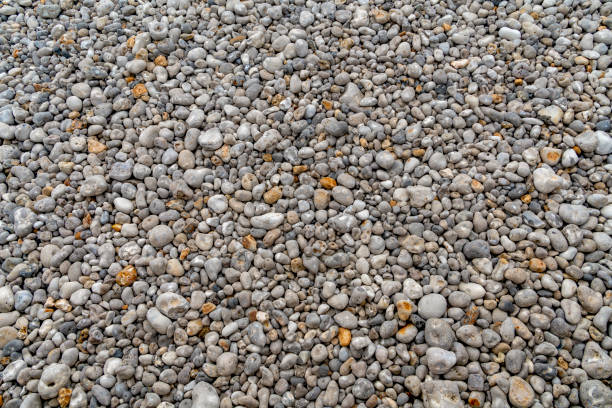 Closeup coastal scenery showing lots of pebbles seen at a beach in the Normandy region of northern France