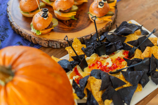 istock Halloween-themed catering served on a table at a costume party 2181928278