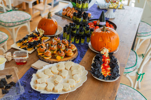 istock Halloween-themed catering served on a table at a costume party 2181928329