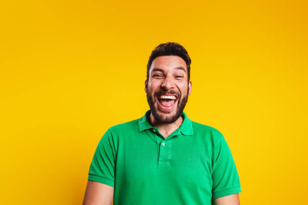 istock Joyful Hispanic Man Portrait Against Yellow Background 2181929303