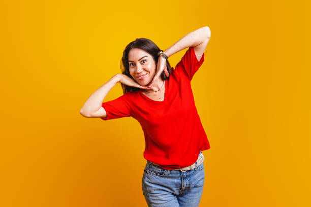 istock Cheerful Hispanic Woman Posing in Red Shirt 2181929379
