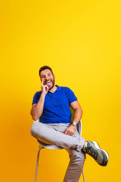 istock Happy Hispanic Man Smiling in Blue Shirt Portrait 2181929385