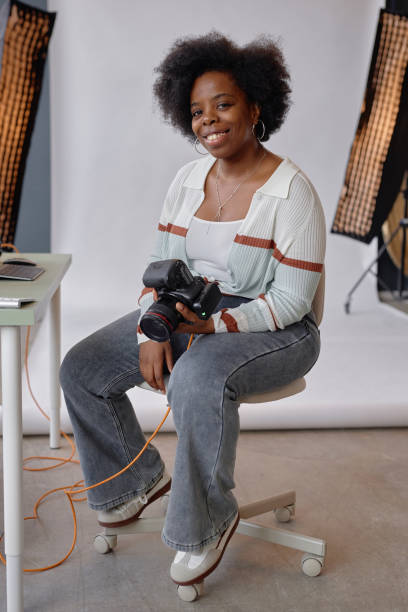 istock Woman Photographer Smiling in Studio 2181930946
