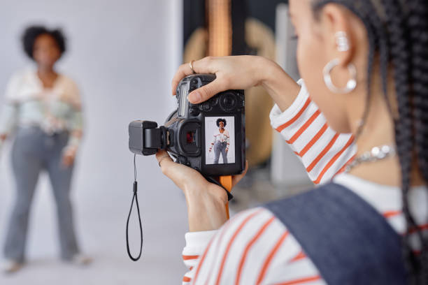 istock Photographer Holding Camera during Photoshoot 2181930983