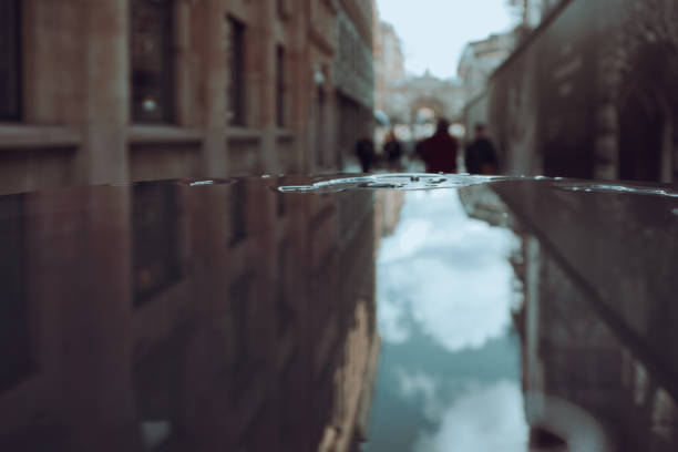 Close up of a railing covered by water