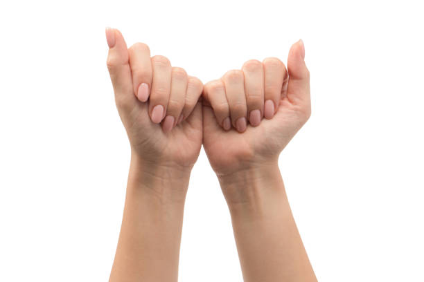 istock Woman hands with nude manicure isolated on a white background. 2181931750
