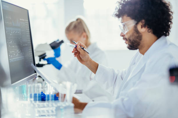 istock Diverse Lab Professionals Engaged in Scientific Research 2181934437