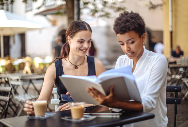 istock Diverse Female Students Studying Together Outdoors 2181934692