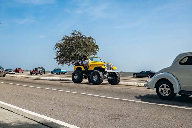 Gulfport, MS - October 04, 2023: Wide angle front corner view of a 1979 Jeep CJ7 Soft Top SUV at a local car show.
