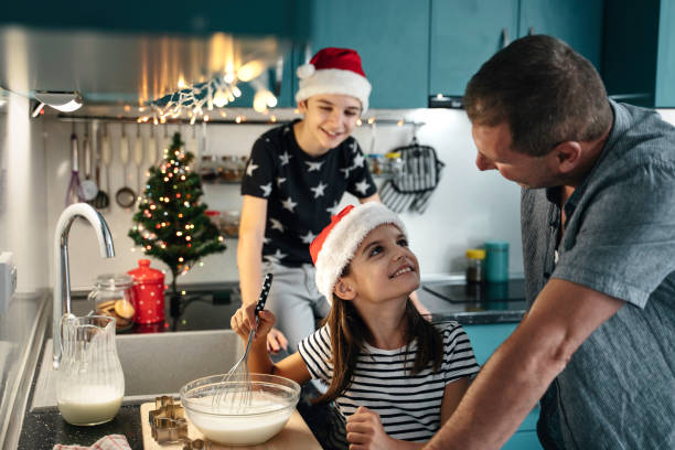 istock Father and daughter bond through holiday baking activity 2181939691