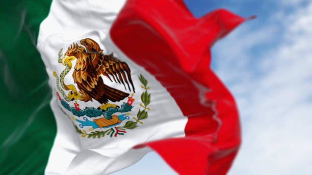 istock Mexico national flags waving on a clear day 2181948866