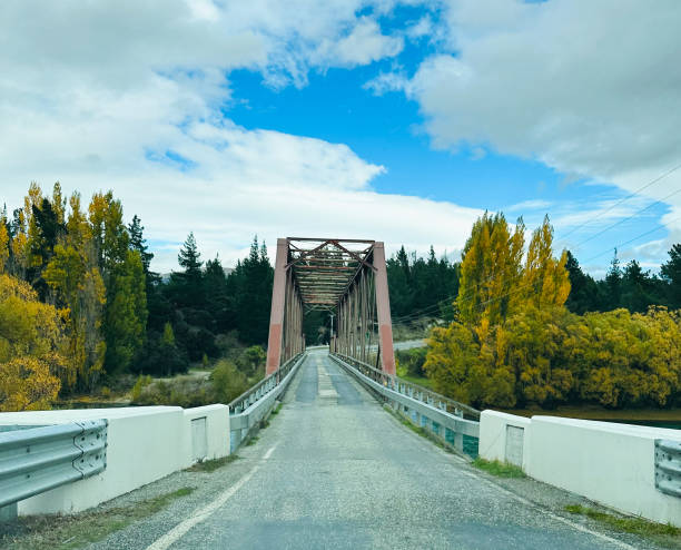 istock Suspension Bridge in Autumn Landscape 2181949887
