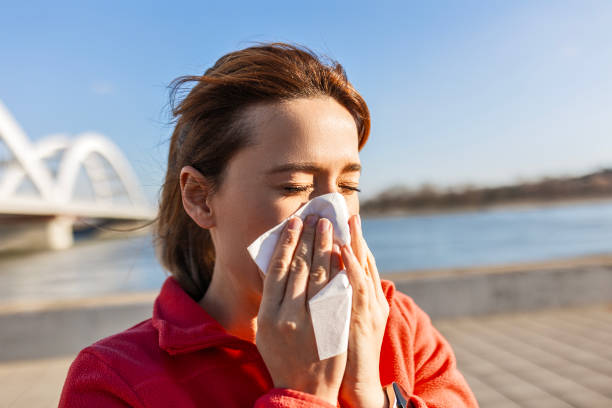 istock Sportswoman Takes a Break for a Sneeze 2181950847