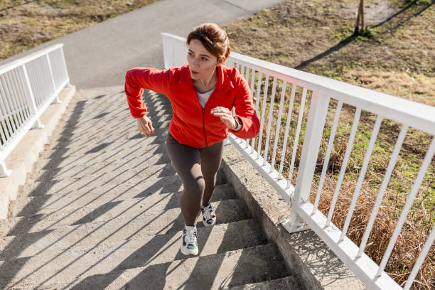 istock Active Woman Engaged in Stair Running Workout 2181950859