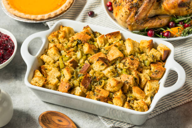 Homemade Turkey Stuffing for Thanksgiving Dinner Homemade Turkey Stuffing for Thanksgiving Dinner in a Casserole Dish thanksgiving full stock pictures, royalty-free photos & images