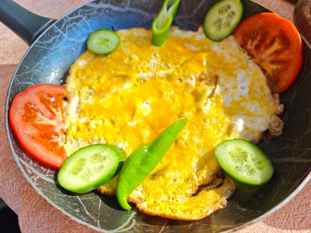 tasty omelette in a pan  with vegetables
