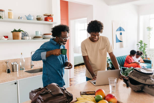 istock Father and son enjoying daily morning routine in the kitchen 2181953703
