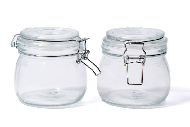 istock Empty glass jars located on a white background, two Empty glass jars, 2181955112