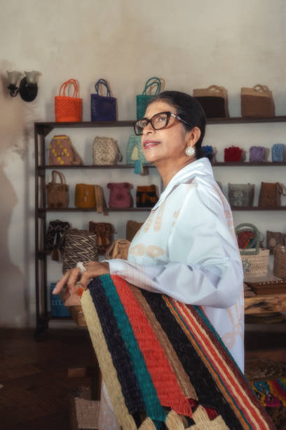 Woman traditional designer and craft Merchants. In her bussiness she always decided to show Colombian Culture trought the jerwely and the handcrafts derivate to the nature.