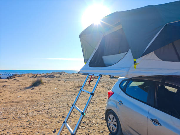 istock car tent on the beach 2181956787