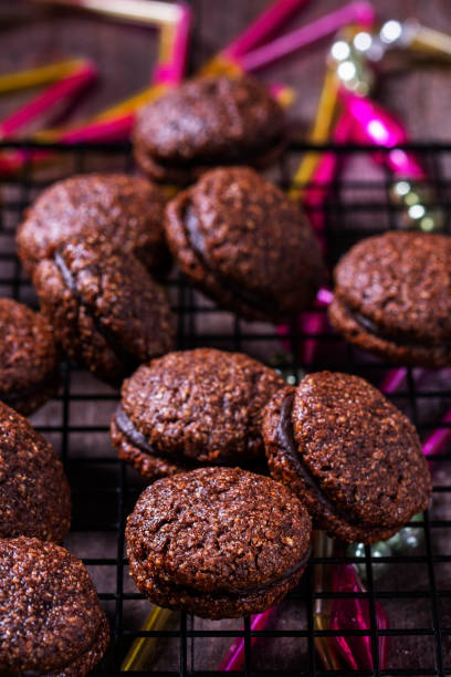 istock Baci de Alassio, Italian cookie made from nut dough and filled with chocolate ganache. 2181961720