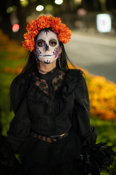 istock Catrina at Night with Marigold Garden Background 2181963443