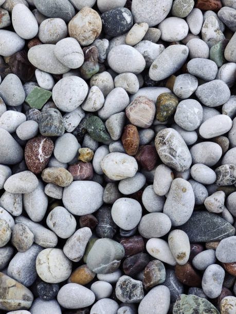 istock close up of pebble stones on a rocky beach 2181963549