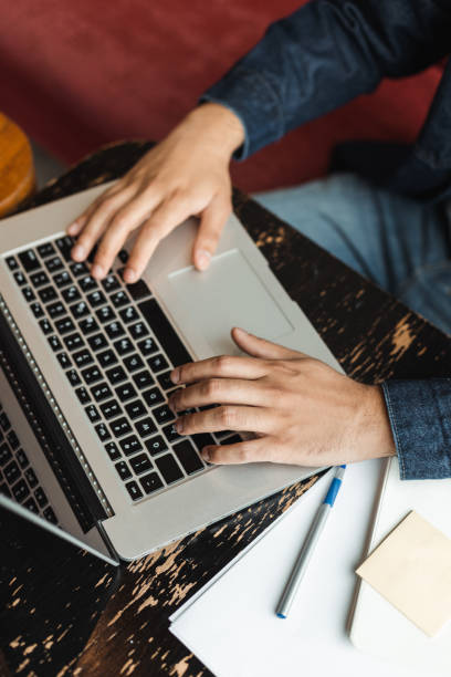istock Freelancer working on laptop in cozy cafe environment 2181963711