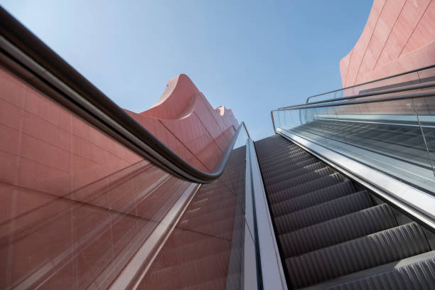 istock Outdoor elevator next to red brick building 2181965115