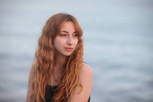 istock serene young woman outdoor 2181966509
