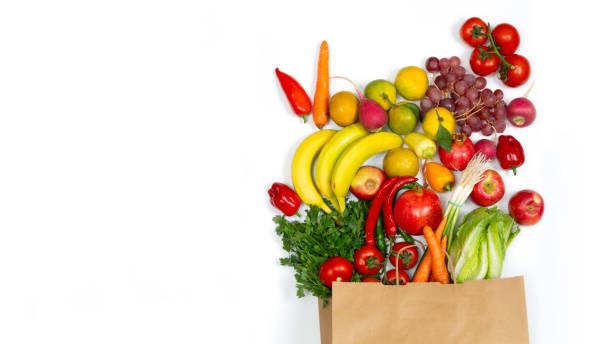 istock fruits and vegetables in paper bag 2181967027