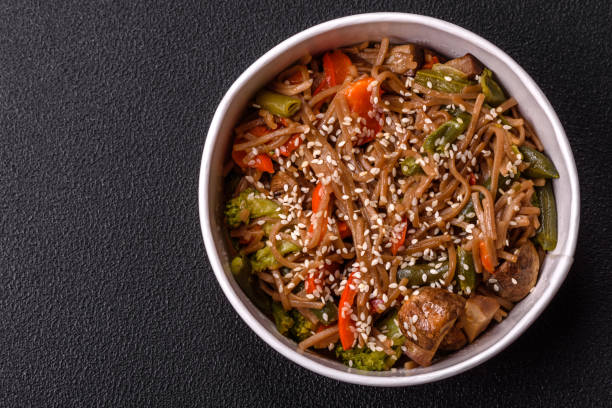 istock Buckwheat noodles with vegetables, salt and spices 2181967076