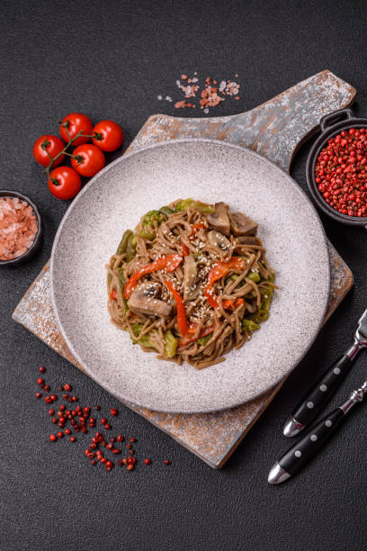 istock Buckwheat noodles with vegetables, salt and spices 2181967186