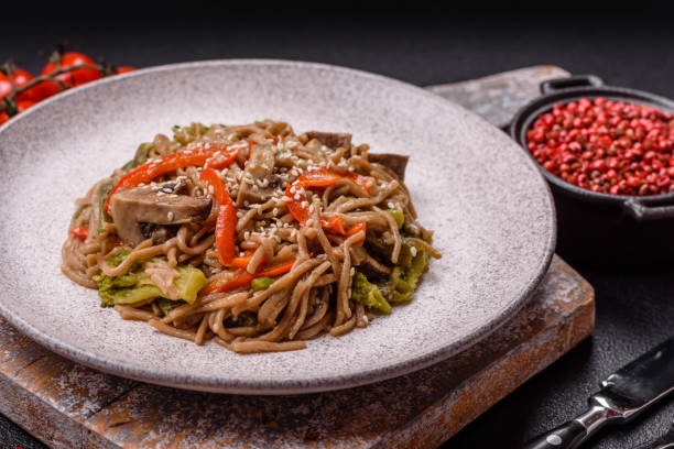 istock Buckwheat noodles with vegetables, salt and spices 2181967205