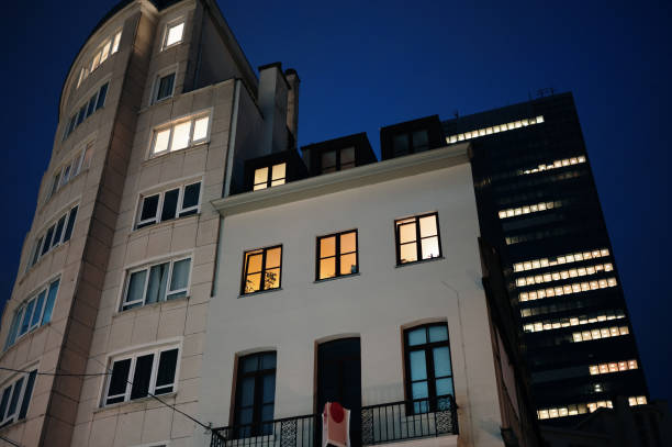 istock Buildings at night with lights on 2181969442