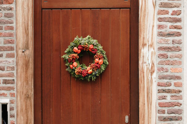A garland hanging on a door