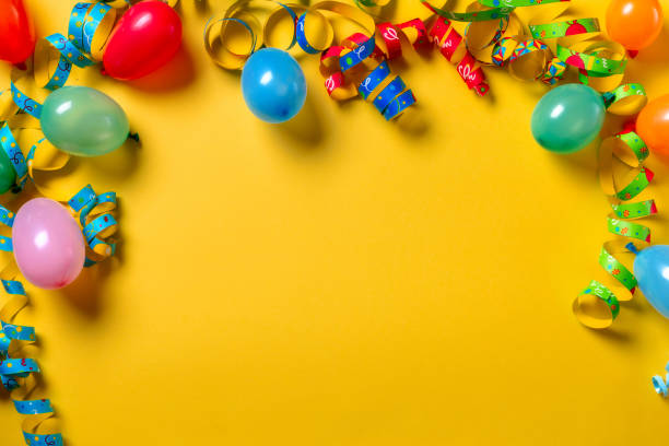 istock Party Decorations on yellow background Celebration concept 2181971469