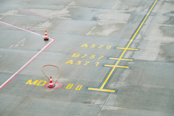 Different airplane markings in an airport parking