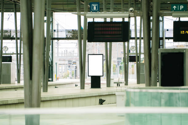 A blank advertisement billboard in a railroad station
