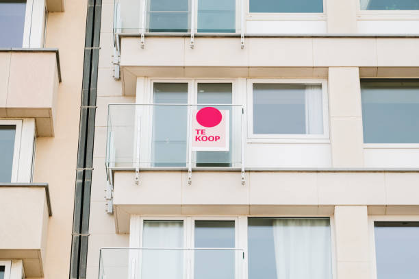 For sale sign in dutch on a building facade