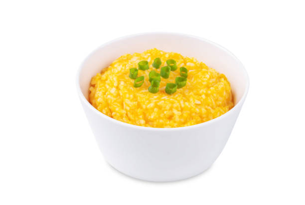 Pumpkin rice in a bowl on a white isolated background. toning