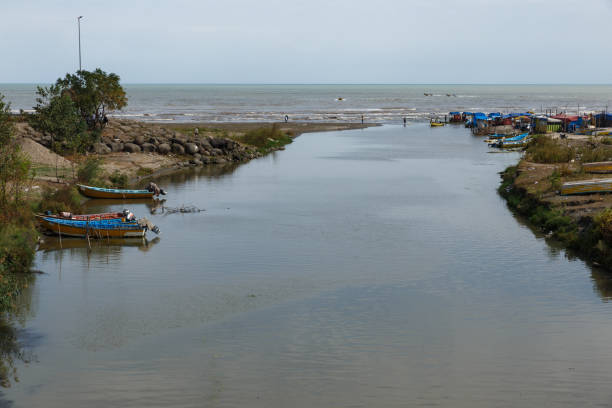 Astara, Gilan Province, Iran - September 27, 2024: The Mordab River in the Astara city. View of the river flowing into the Caspian Sea.