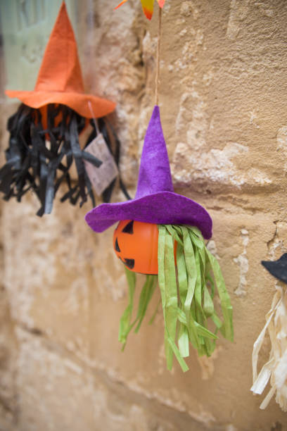 istock Halloween decoration on the street. Witch with hat 2181986076