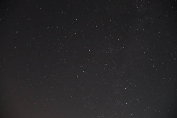 istock Starry Night Sky with a Shooting Star 2181987825