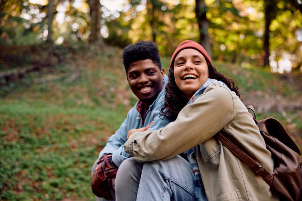 istock Happy multiracial couple spending an autumn day in nature. 2181987992