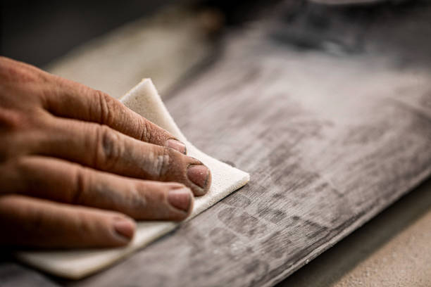Handcrafted Beauty: Artisan Creating Detailed Designs in Wood